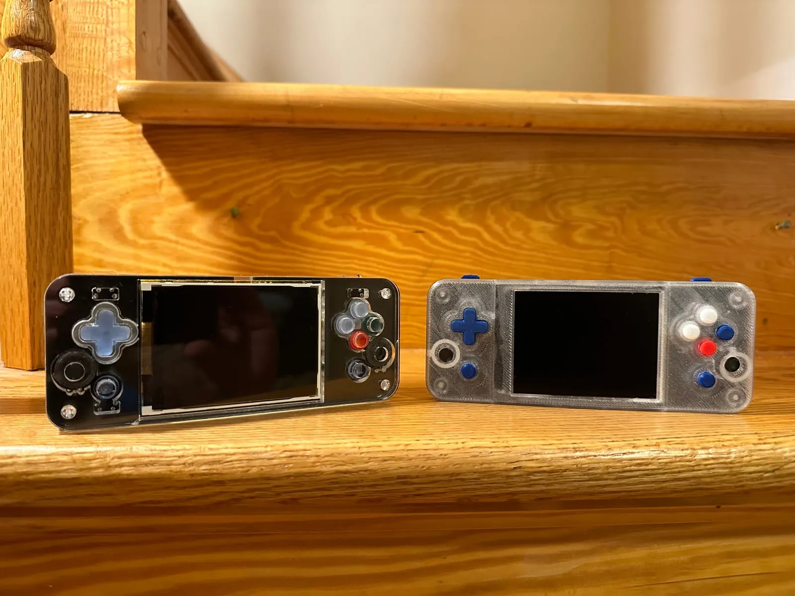 The finished Null 2 handheld in its acrylic case, front view